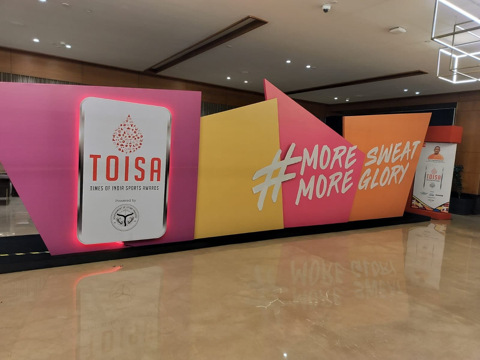 Indoor TOISA welcome backdrop with sponsor branding