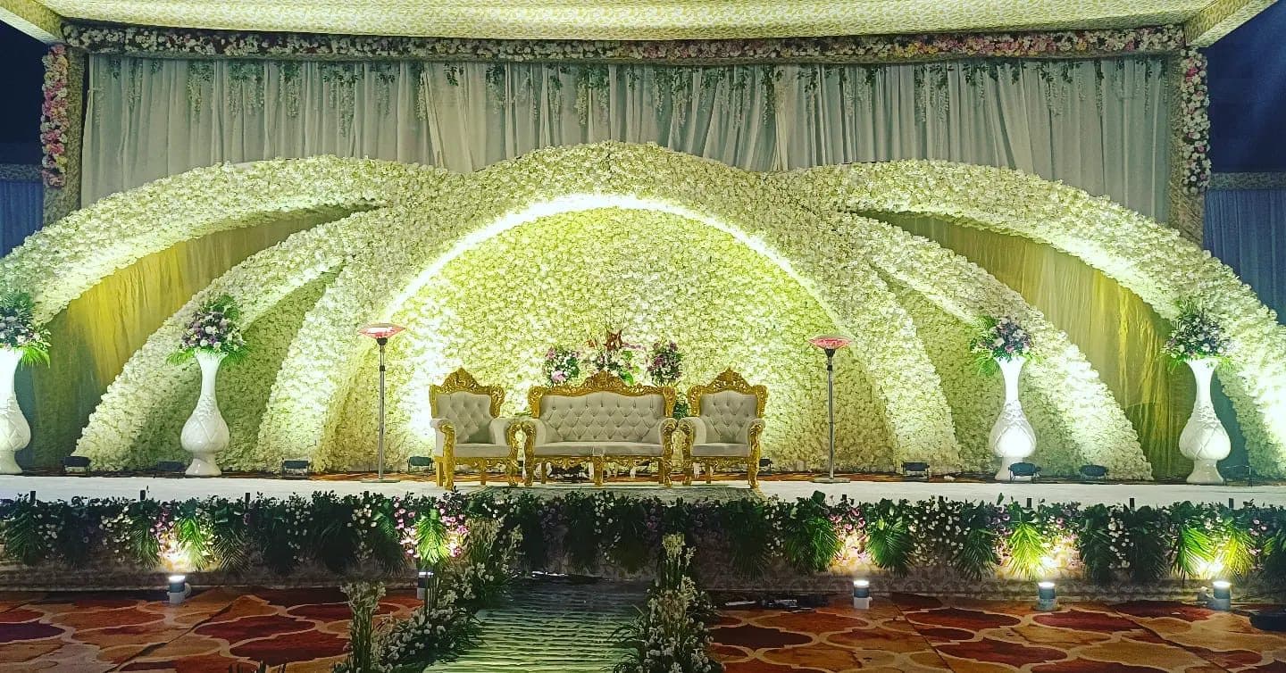 Wedding reception stage with floral dome
