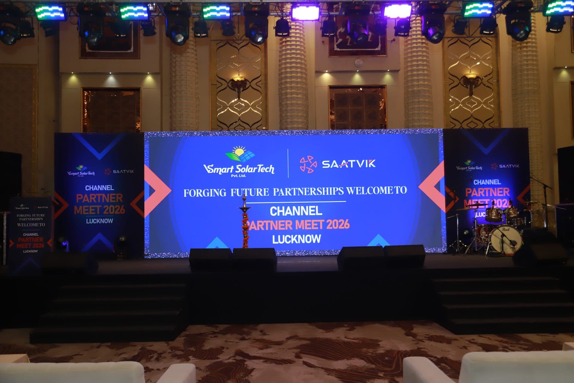 Stage with LED video wall, lighting truss and drum kit setup