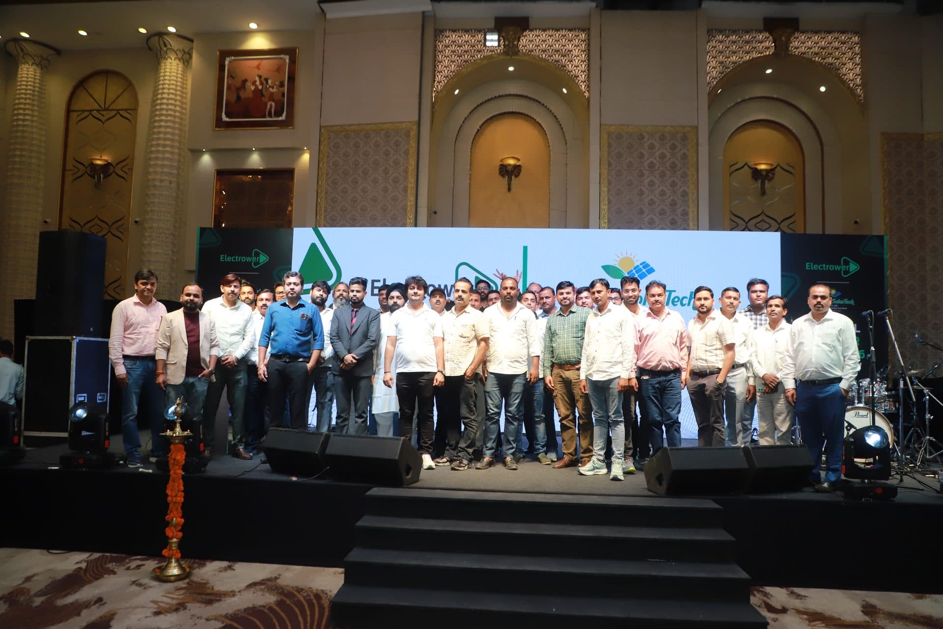 Electrower Channel Partner Meet 2026 group photo on stage