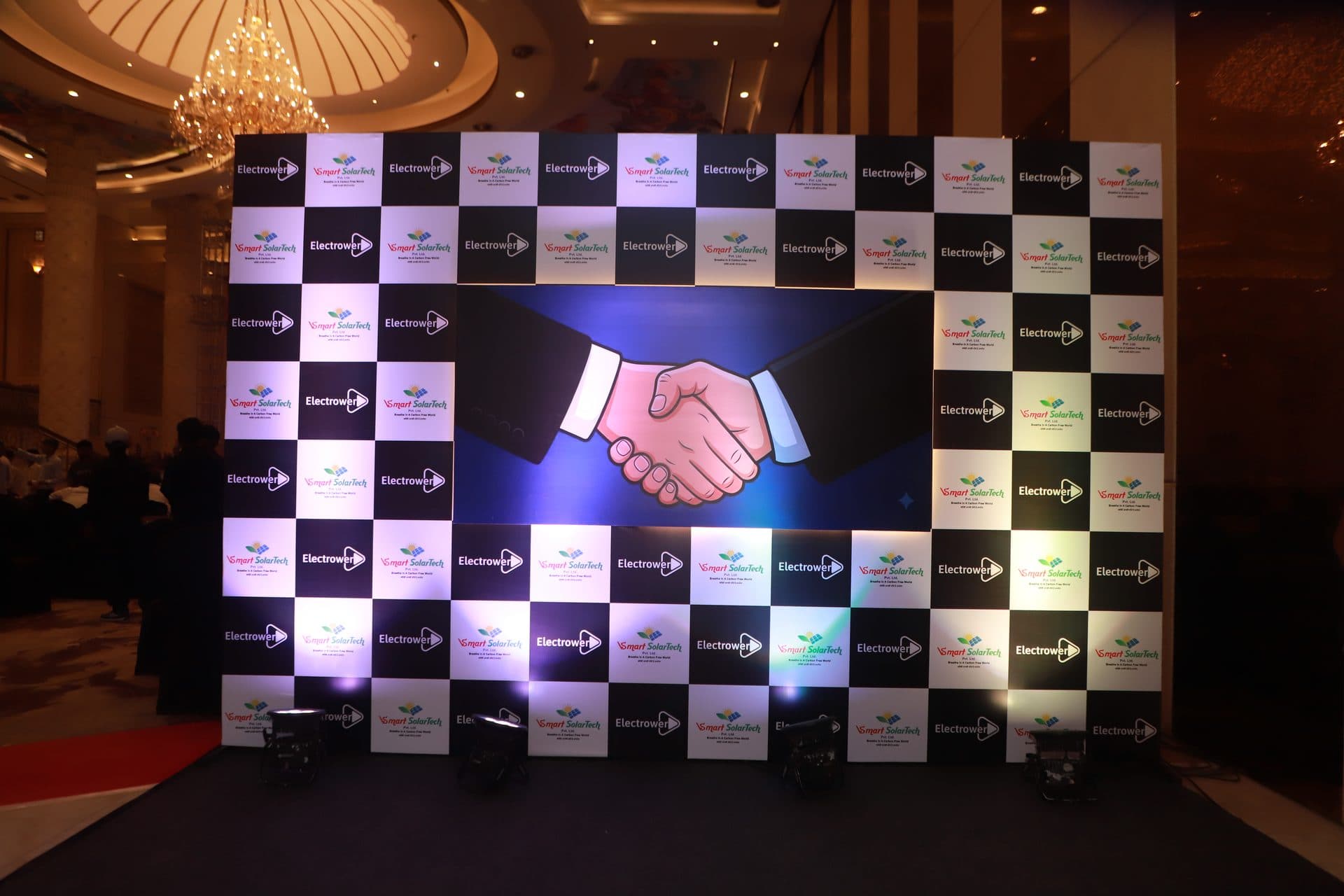 Electrower and VSmart SolarTech branded photo backdrop
