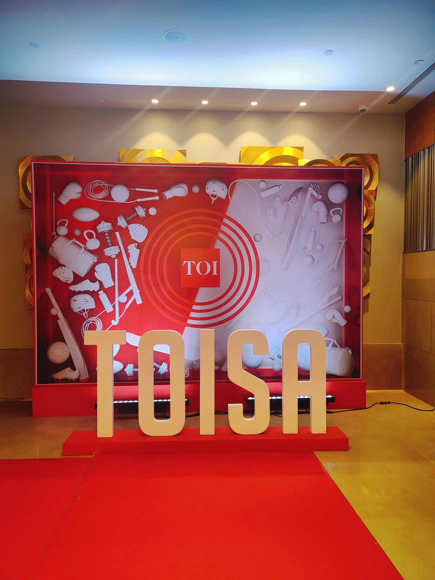TOISA red carpet entrance backdrop at night
